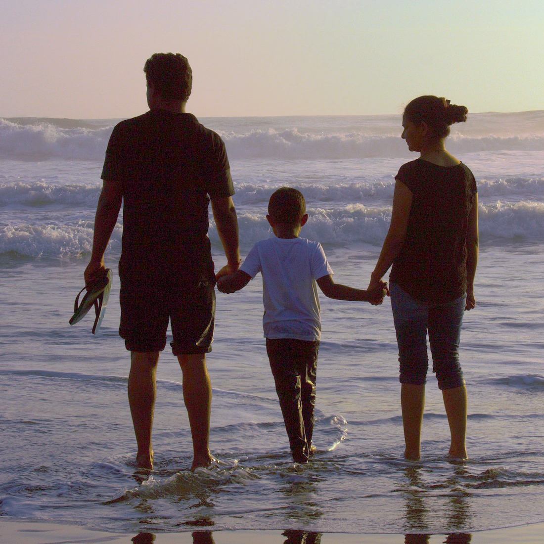 Famiglia sulla spiaggia